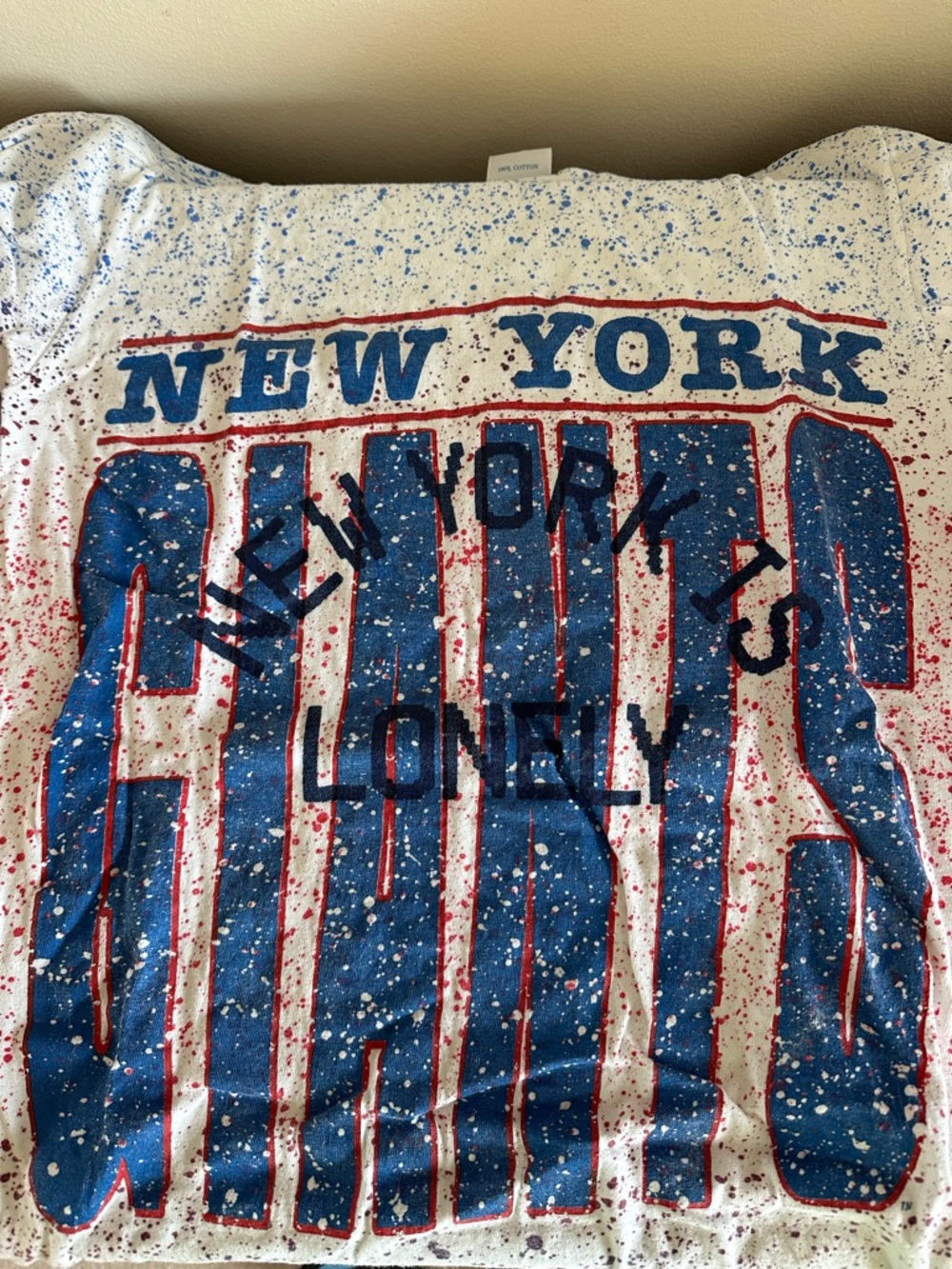 New York Giants Graphic Tee - White, Blue & Red Splatter. LONELY GHOST EXCLUSIVE